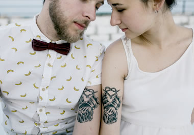 Couple with matching tattoos
