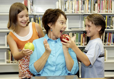 The students get brownie points for bringing the teacher apples.
