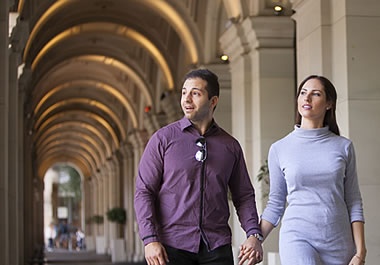 A couple walking through an archway