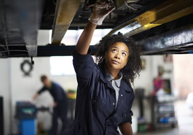 The woman is a mechanic by trade.