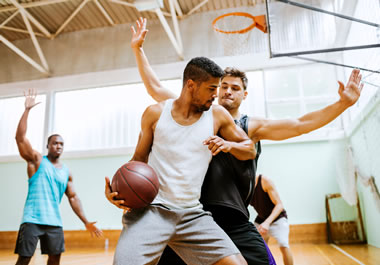 The men are playing an aggressive, in-your-face style of basketball.