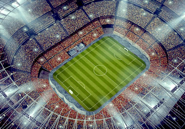 A stadium with a soccer field