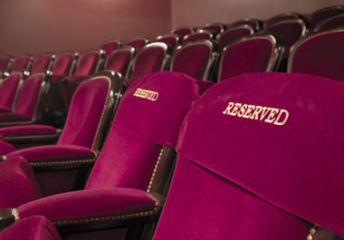 Reserved seating for special guests is in the front row.