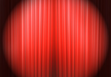 Spotlight shining on curtain