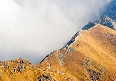 A mountain ridge in the clouds