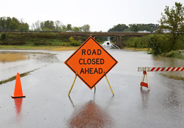 The road is closed until the water subsides.
