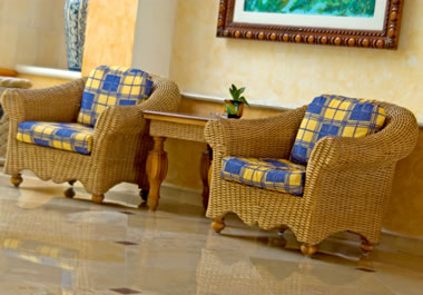 Wicker chairs with seat cushions