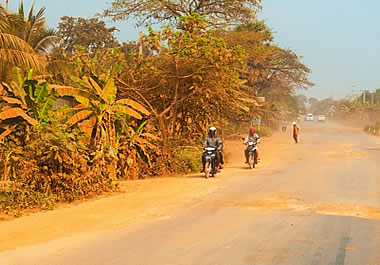 A layer of sand covering a highway in Cambodia