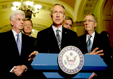 U.S. senators holding a news conference to mobilize support for a proposed law