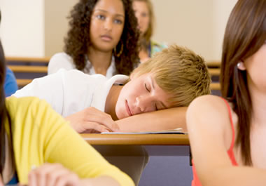 A student dozing off in class