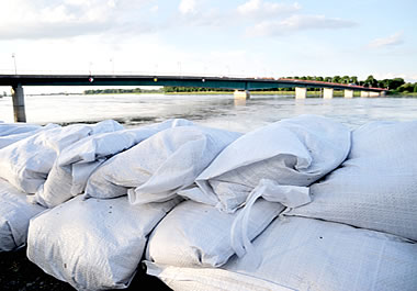 Riverbank reinforced with sandbags, for protection against floods