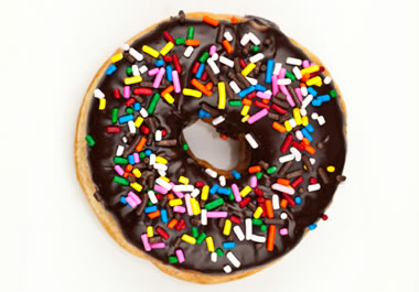 Doughnut with chocolate icing and sprinkles