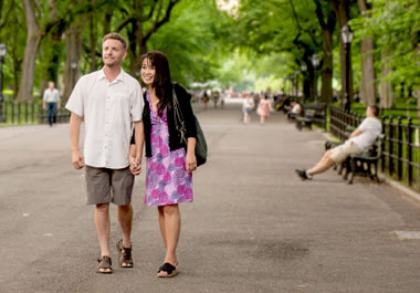 A couple strolling in the park
