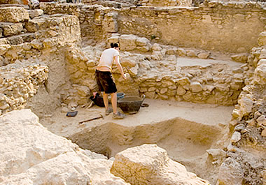Archeologist helping to excavate an ancient site in Greece