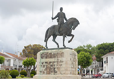 A statue on a stone pedestal