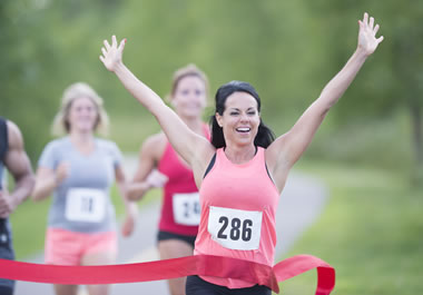 The woman is exhilarated by her victory