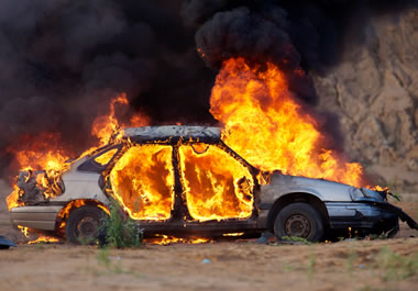 A car engulfed in flames