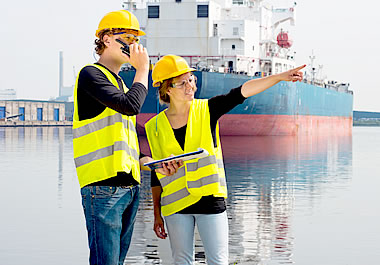 Two engineers wearing reflective vests