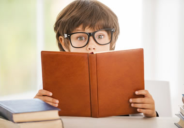 A bookish child reading