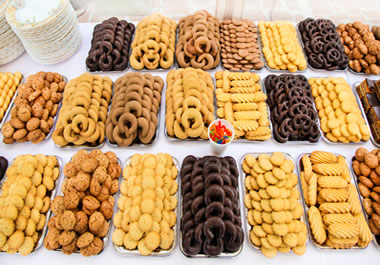 The dessert table featured an extravagant assortment of cookies.