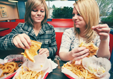 Two friends having lunch at their favorite eatery