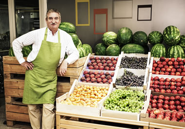 The man sells homegrown fruit.
