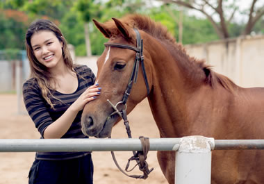 She aspires to be a championship rider.