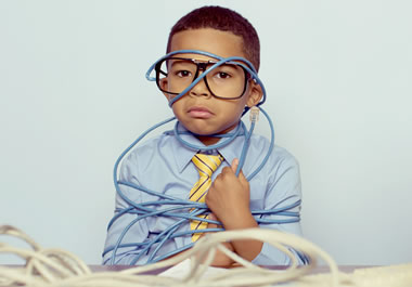 The boy is entangled in the wires.