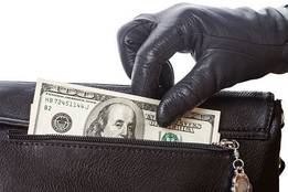 gloved-hand-stealing-money