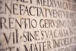 latin words engraved in stone