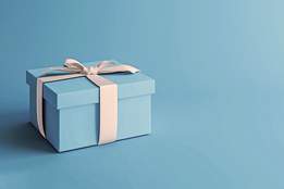 light blue gift box on light blue background