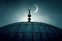 mosque with crescent moon in background