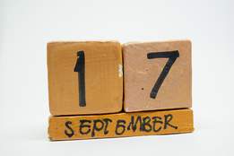 wooden blocks with 17 september written on them