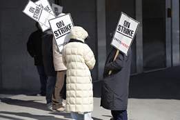 workers standing on a picket line