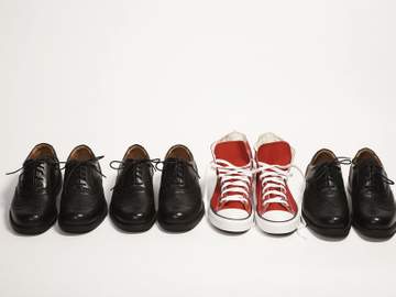3 pairs of dress shoes and pair of sneakers