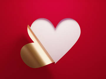 golden heart folding onto red background