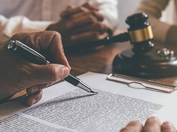 lawyer looking over contract