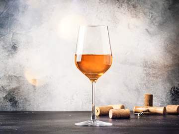 orange wine in wine glass