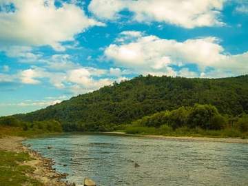 river next to hillside