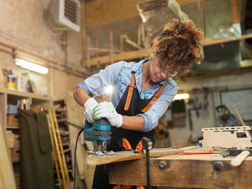 woman working on wood