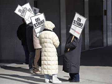 workers standing on a picket line