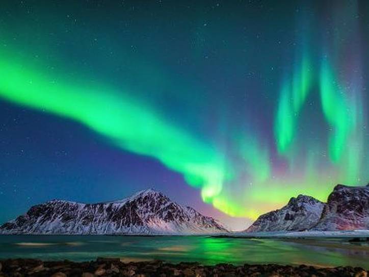 Aurora Borealis Spark through Moon and its Halo - Sky & Telescope