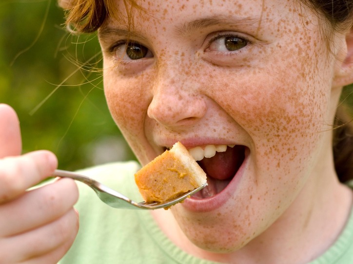 Funny apple pie. Eating with fork Selfe.