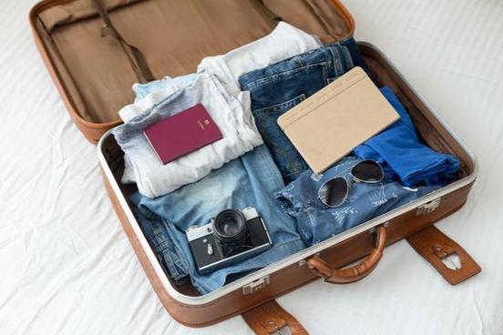 CarryOn vs Checked Bag What to Know  NerdWallet