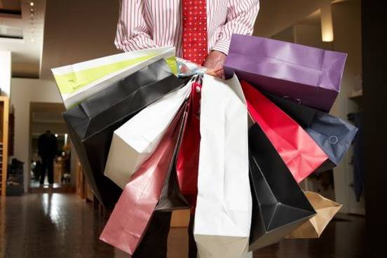 man-with-lots-of-shopping-bags