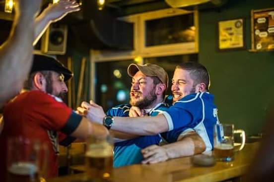 men fighting in bar