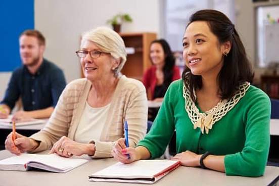 older woman in college class