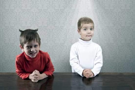 one boy dressed as angel and one boy dressed as devil