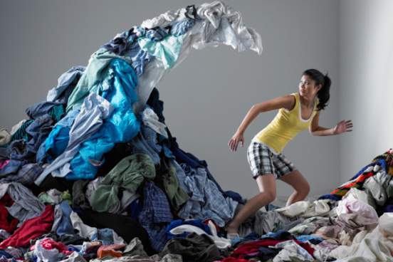 woman with giant wave of clothes