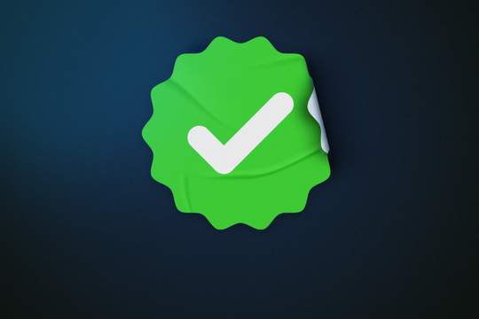 green checkmark stamp peeling slightly